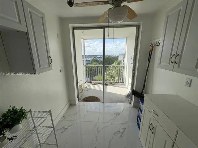 a view of closet area with empty racks