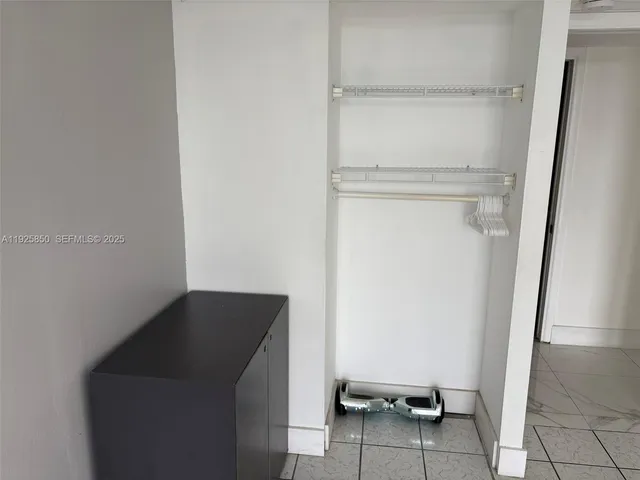 a bathroom with a shower and a tub
