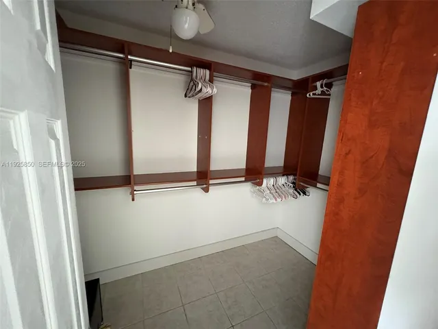 a bathroom with a shower and a toilet