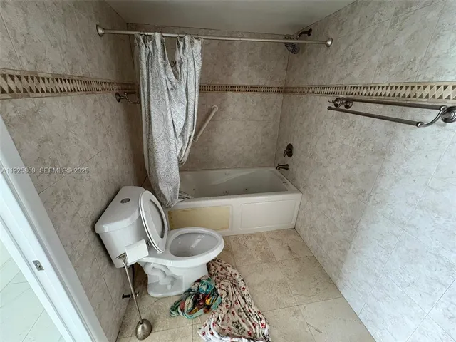 a view of a building with a yard