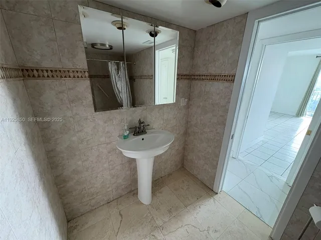 a view of a building with a yard