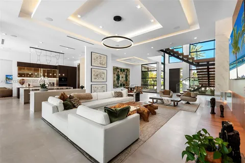 a spacious bedroom with a bed and a window