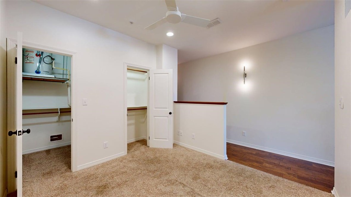 206 North Main Street, Unit 124 Bryan, TX 77803 - Photo 11 of 17 wooden floor in an empty room