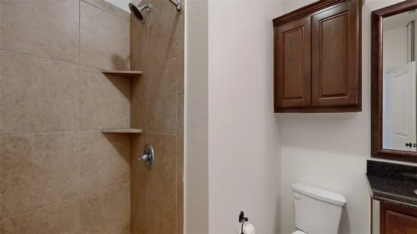 a bathroom with a sink and toilet