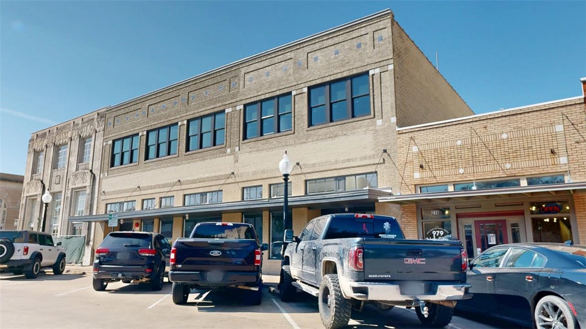 206 North Main Street, Unit 124 Bryan, TX 77803 - Photo 16 of 17 a car parked in front of a building
