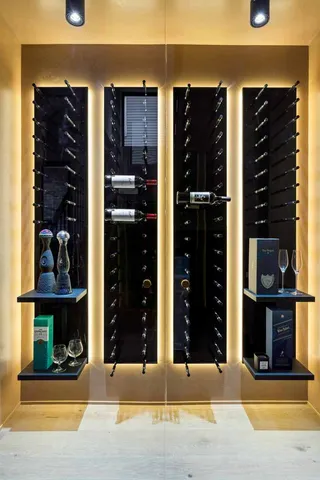 a kitchen with a stove and a potted plant