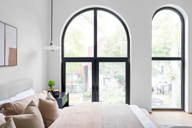 a bathroom with a double vanity sink mirror and double