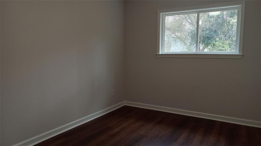 2156 Park Terrace, Unit 3 Atlanta, GA 30337 - Photo 24 of 29 an empty room with a window