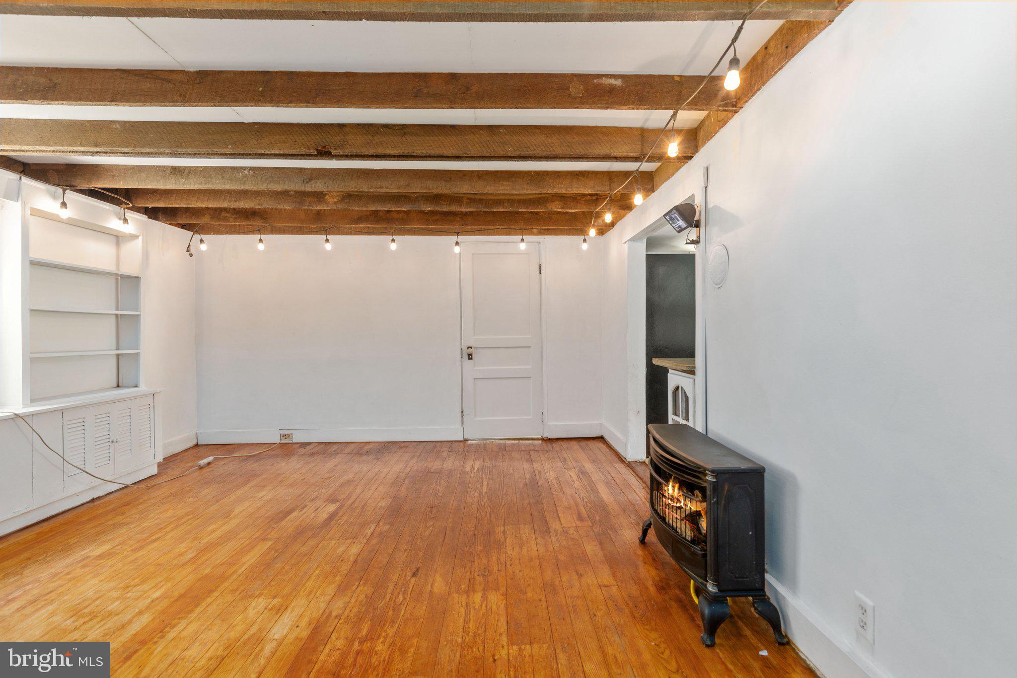 7443 Keith Road Warrenton, VA 20186 - Photo 13 of 44 Living Room- love the exposed beams!