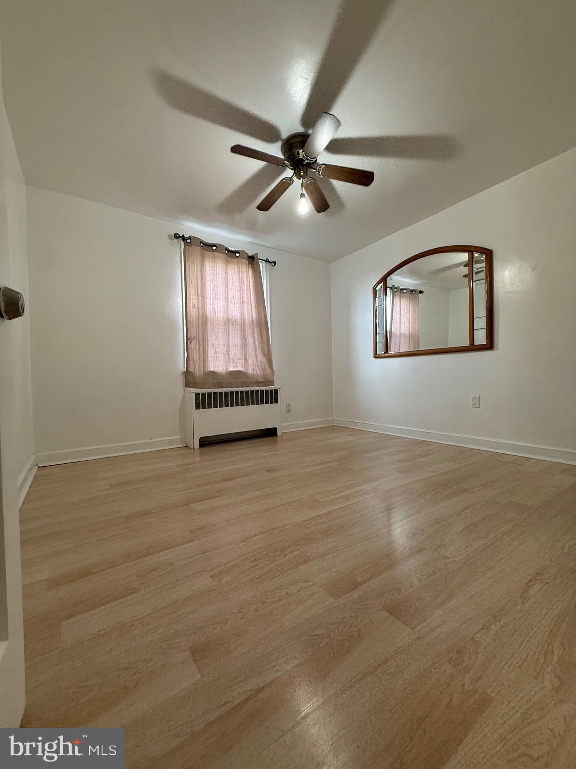 3220 Guilford Street Philadelphia, PA 19136 - Photo 15 of 20 an empty room with windows and fan
