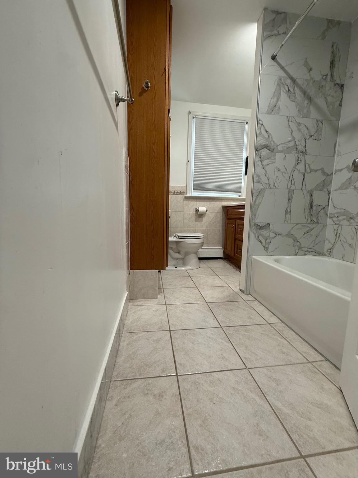 3220 Guilford Street Philadelphia, PA 19136 - Photo 10 of 20 a bathroom with a bathtub and a shower