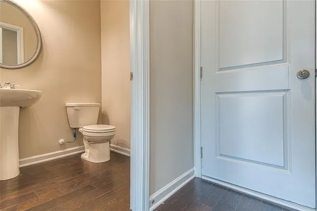 a bathroom with a toilet and a sink