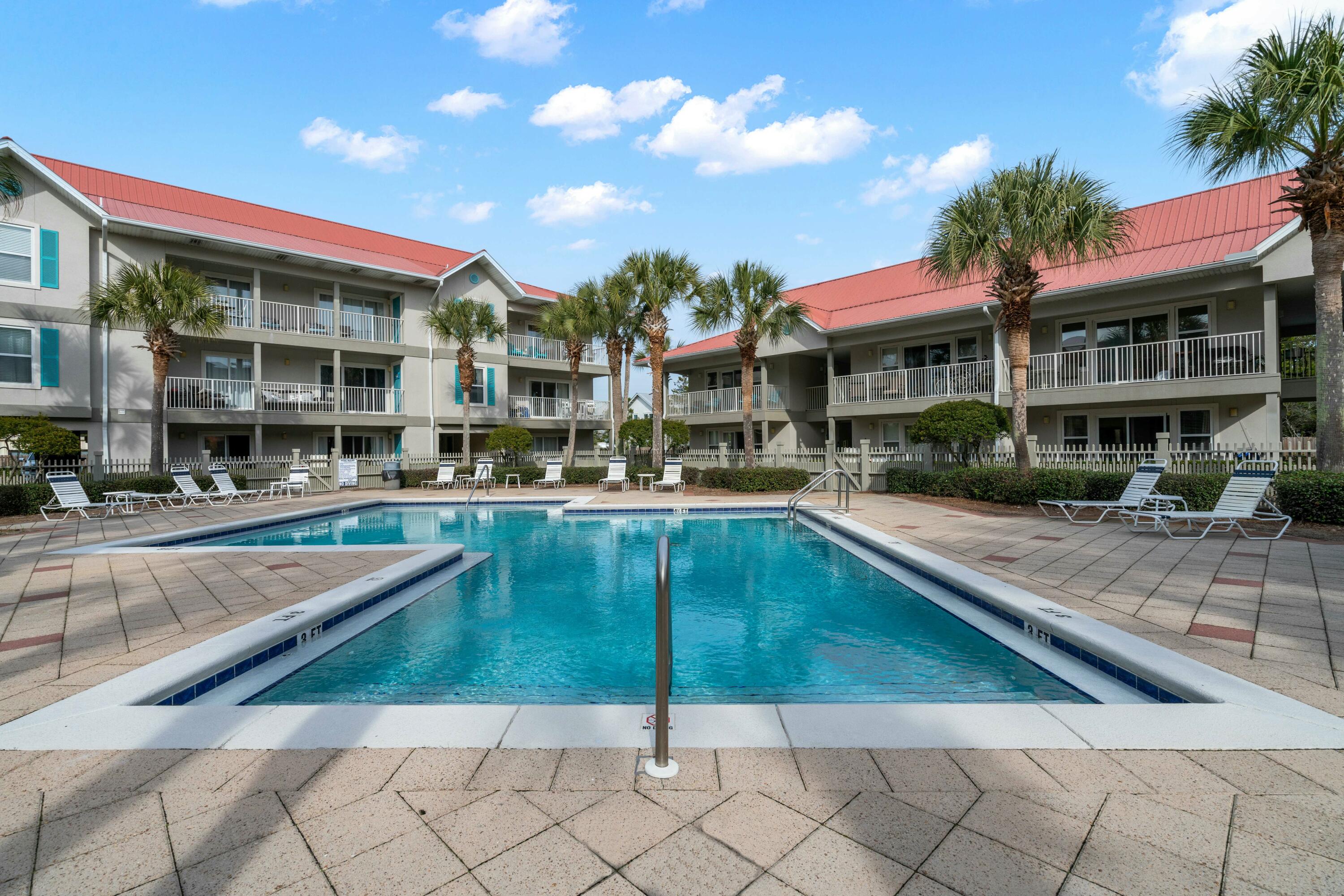 82 Sugar Sand Lane, Unit C1 Santa Rosa Beach, FL 32459 - Photo 18 of 29 a swimming pool view with a seating space and a garden view