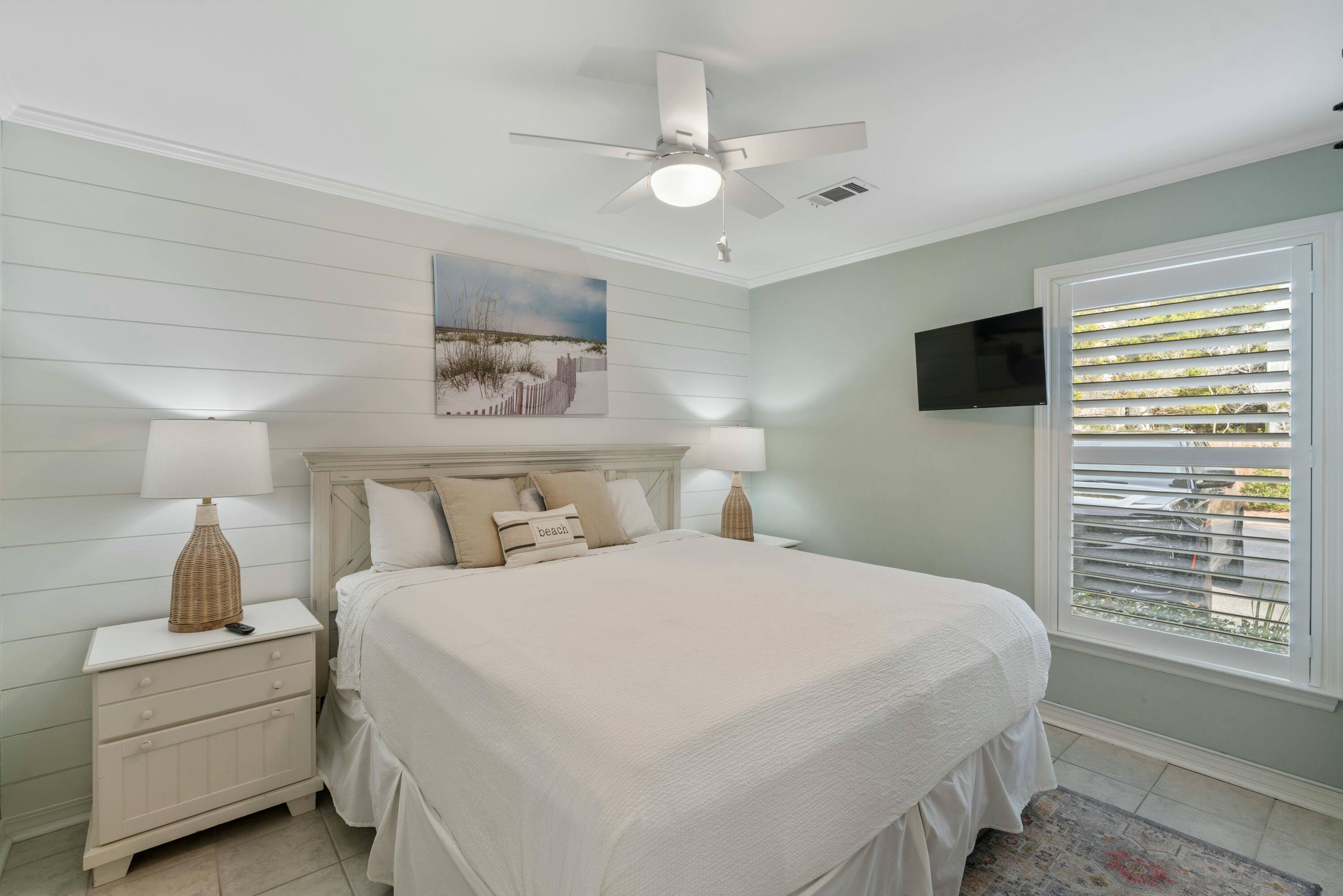 82 Sugar Sand Lane, Unit C1 Santa Rosa Beach, FL 32459 - Photo 10 of 29 a bedroom with a large bed and a window