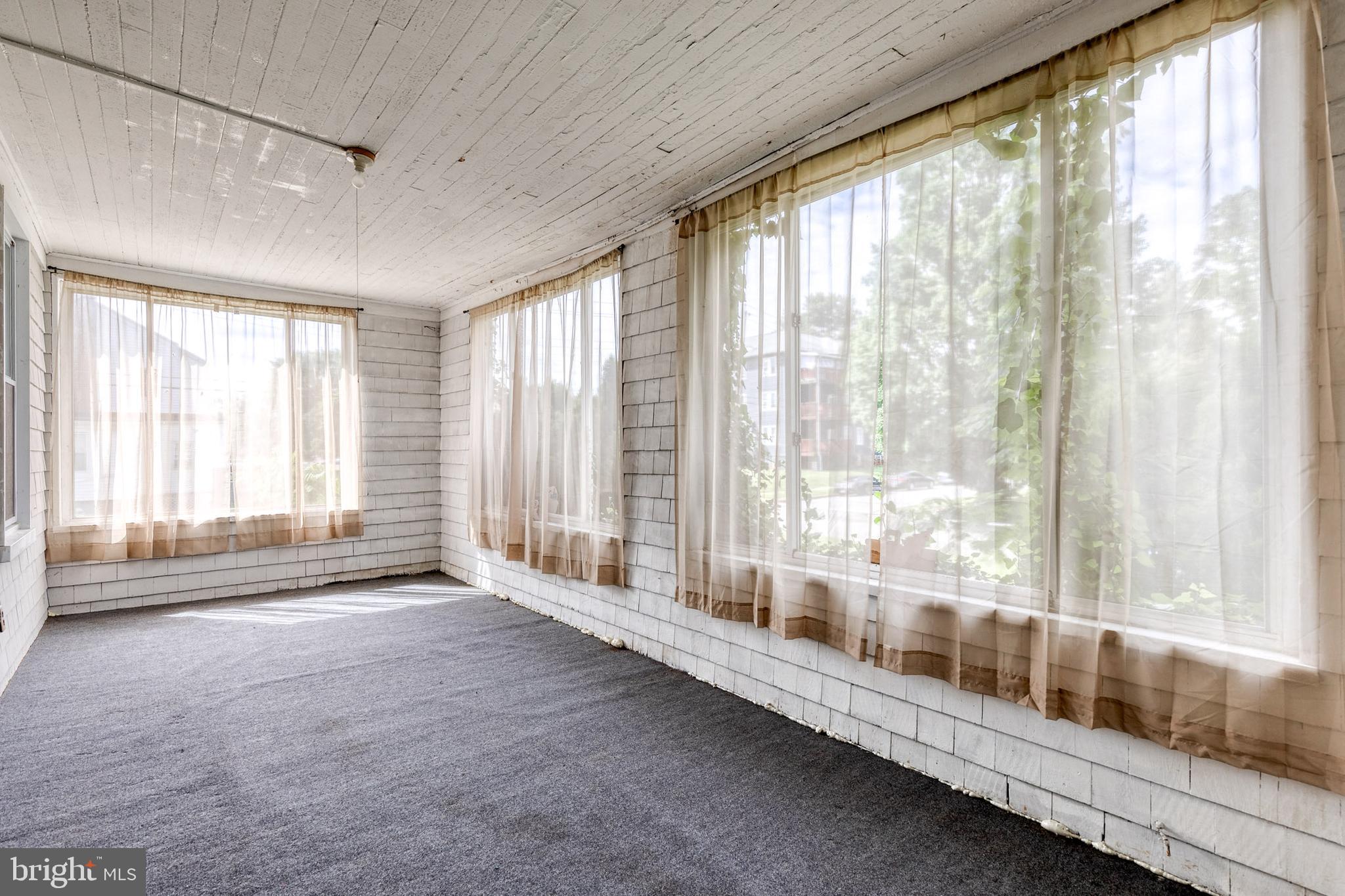 3711 Egerton Road Baltimore, MD 21215 - Photo 23 of 36 Unit 1 closed in porch