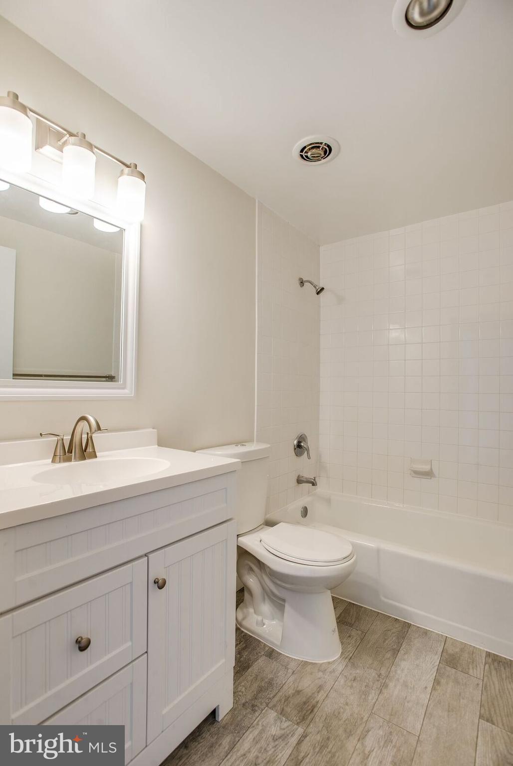9701 Fields Road, Unit 2301 Gaithersburg, MD 20878 - Photo 12 of 21 Upd Hall BA w/New Vanity, Floor, Light/Mirror