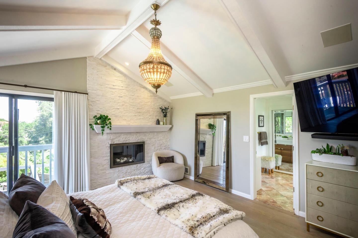 2651 Summit Drive Burlingame, CA 94010 - Photo 13 of 36 a bedroom with a bed and a fireplace