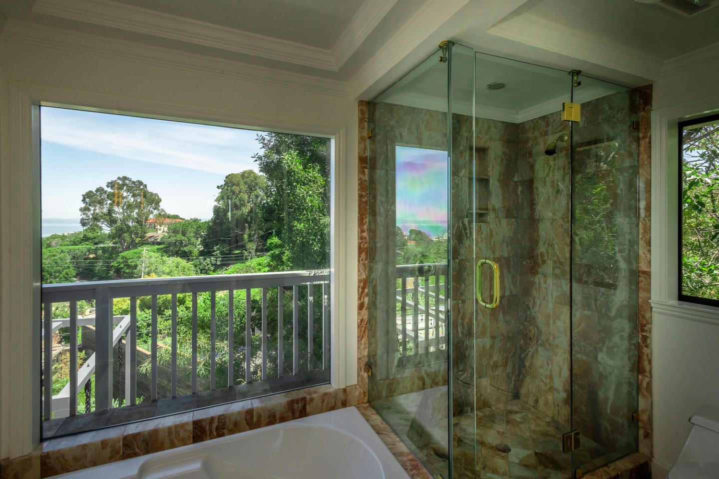 2651 Summit Drive Burlingame, CA 94010 - Photo 18 of 36 a bathroom with a shower and a sink