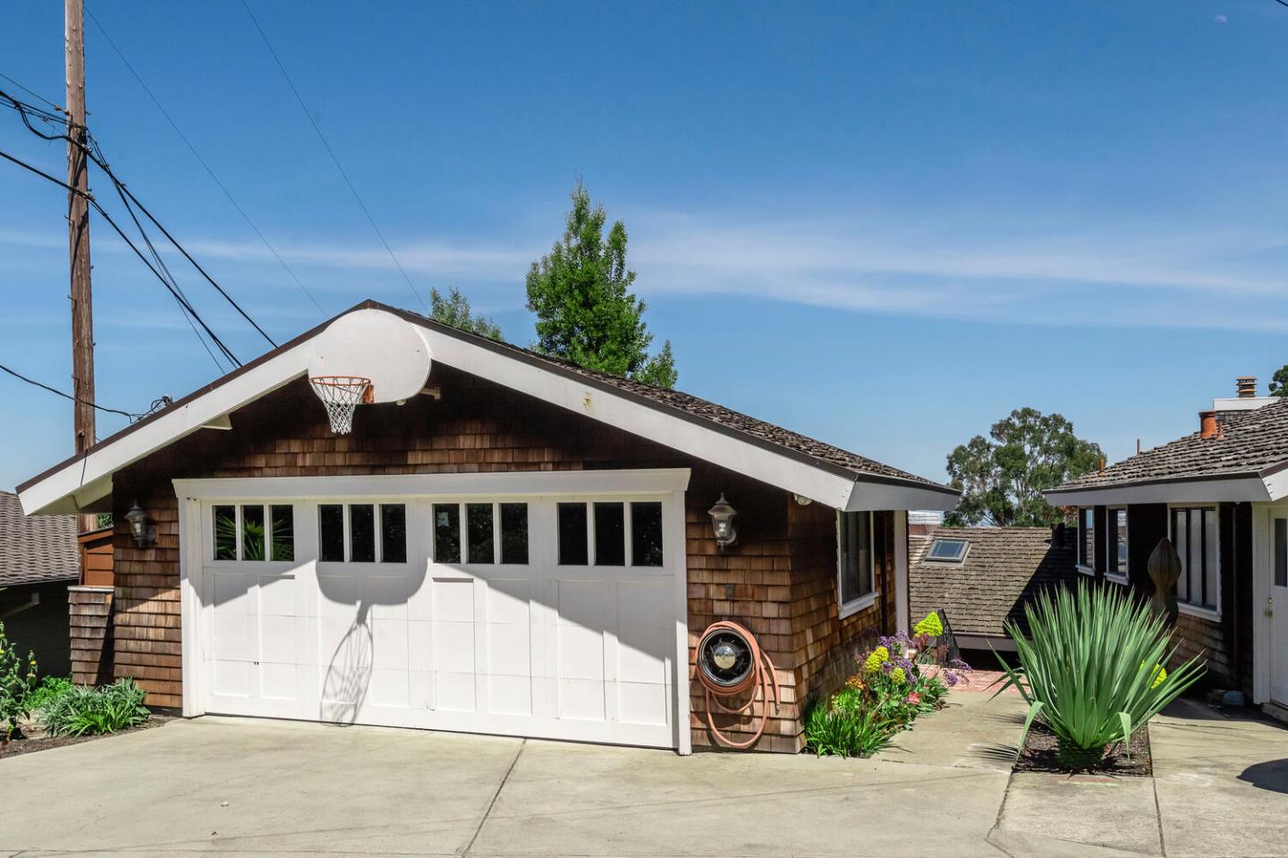2651 Summit Drive Burlingame, CA 94010 - Photo 34 of 36 a front view of house along with road