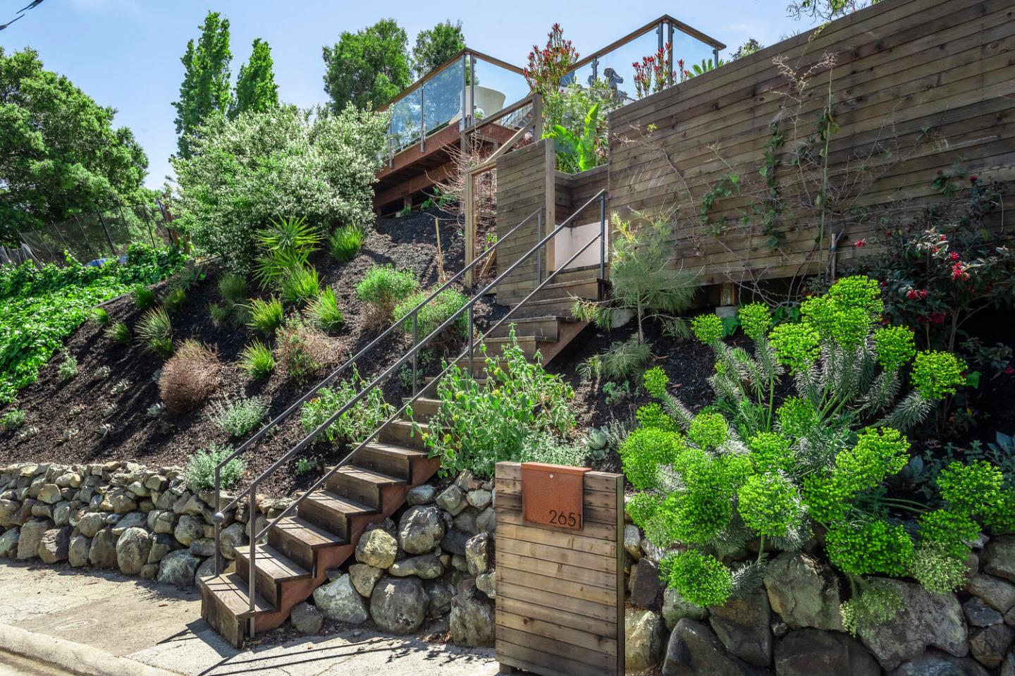 2651 Summit Drive Burlingame, CA 94010 - Photo 36 of 36 a backyard of a house with lots of green space