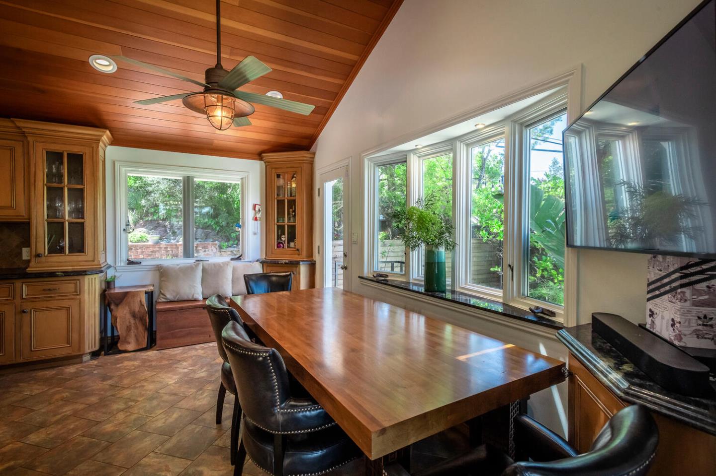 2651 Summit Drive Burlingame, CA 94010 - Photo 9 of 36 a view of a dining room with furniture window and outside view