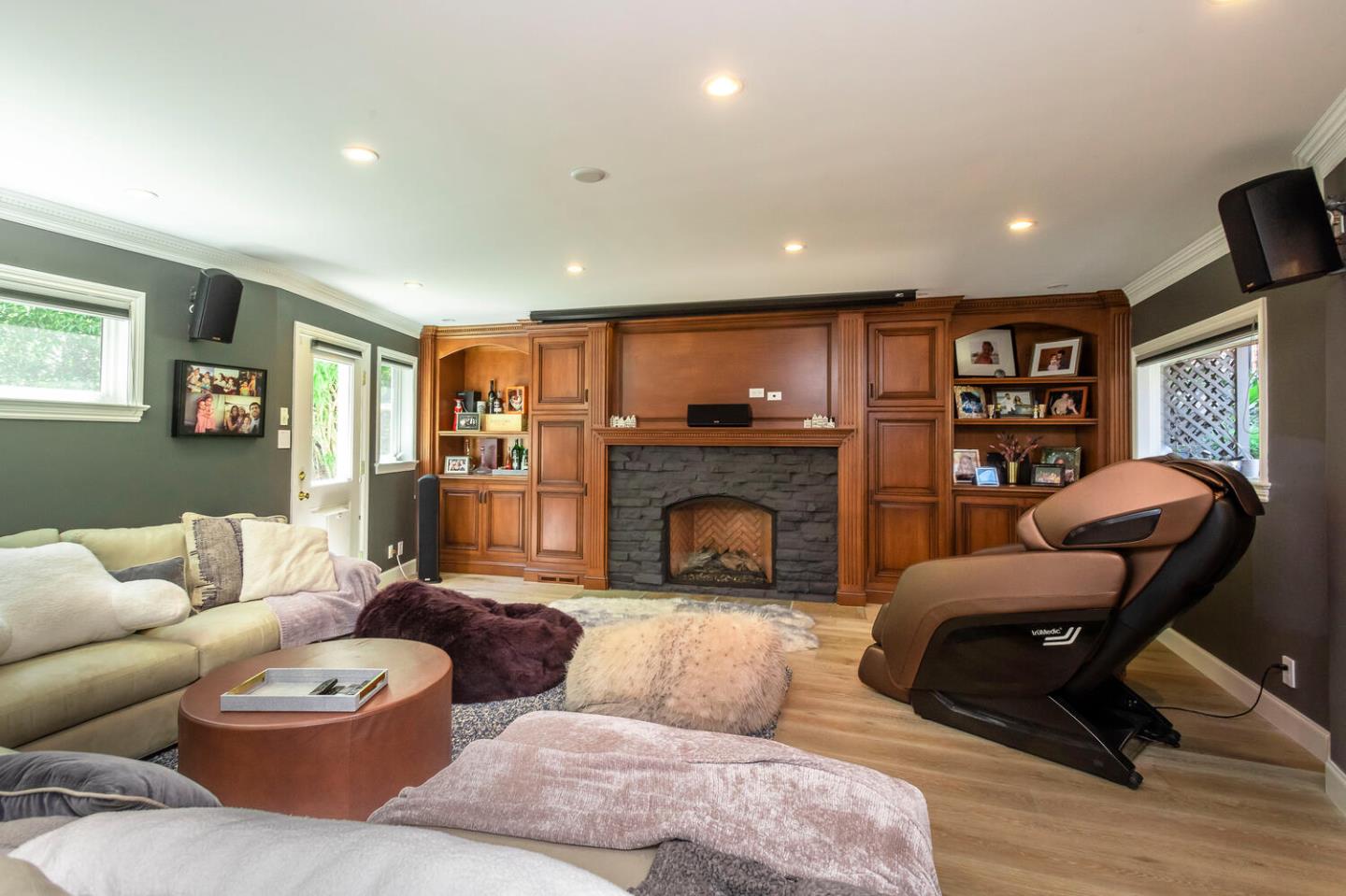 2651 Summit Drive Burlingame, CA 94010 - Photo 10 of 36 a living room with furniture and a fireplace