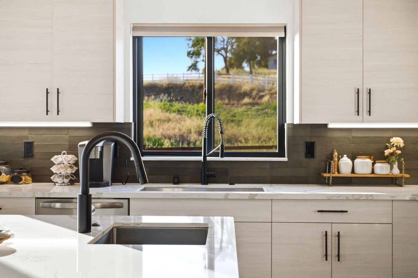 2033 Quiver Street Copperopolis, CA 95228 - Photo 11 of 40 a kitchen with a sink a counter and cabinets