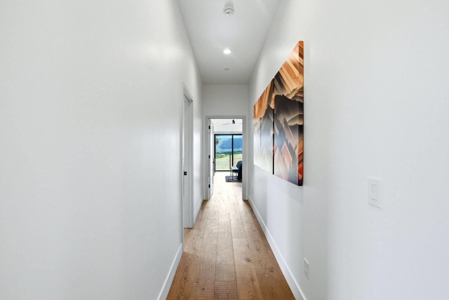 2033 Quiver Street Copperopolis, CA 95228 - Photo 19 of 40 a view of a hallway with wooden floor and staircase
