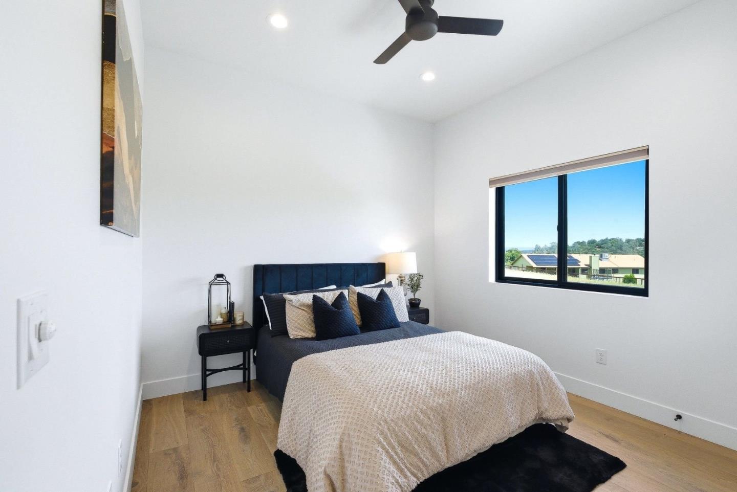 2033 Quiver Street Copperopolis, CA 95228 - Photo 22 of 40 a bedroom with a bed and a painting on the wall