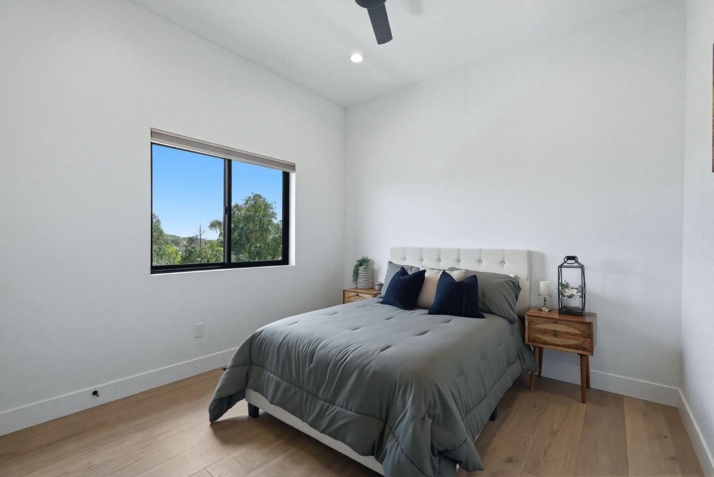 2033 Quiver Street Copperopolis, CA 95228 - Photo 26 of 40 a bedroom with a bed and night stand