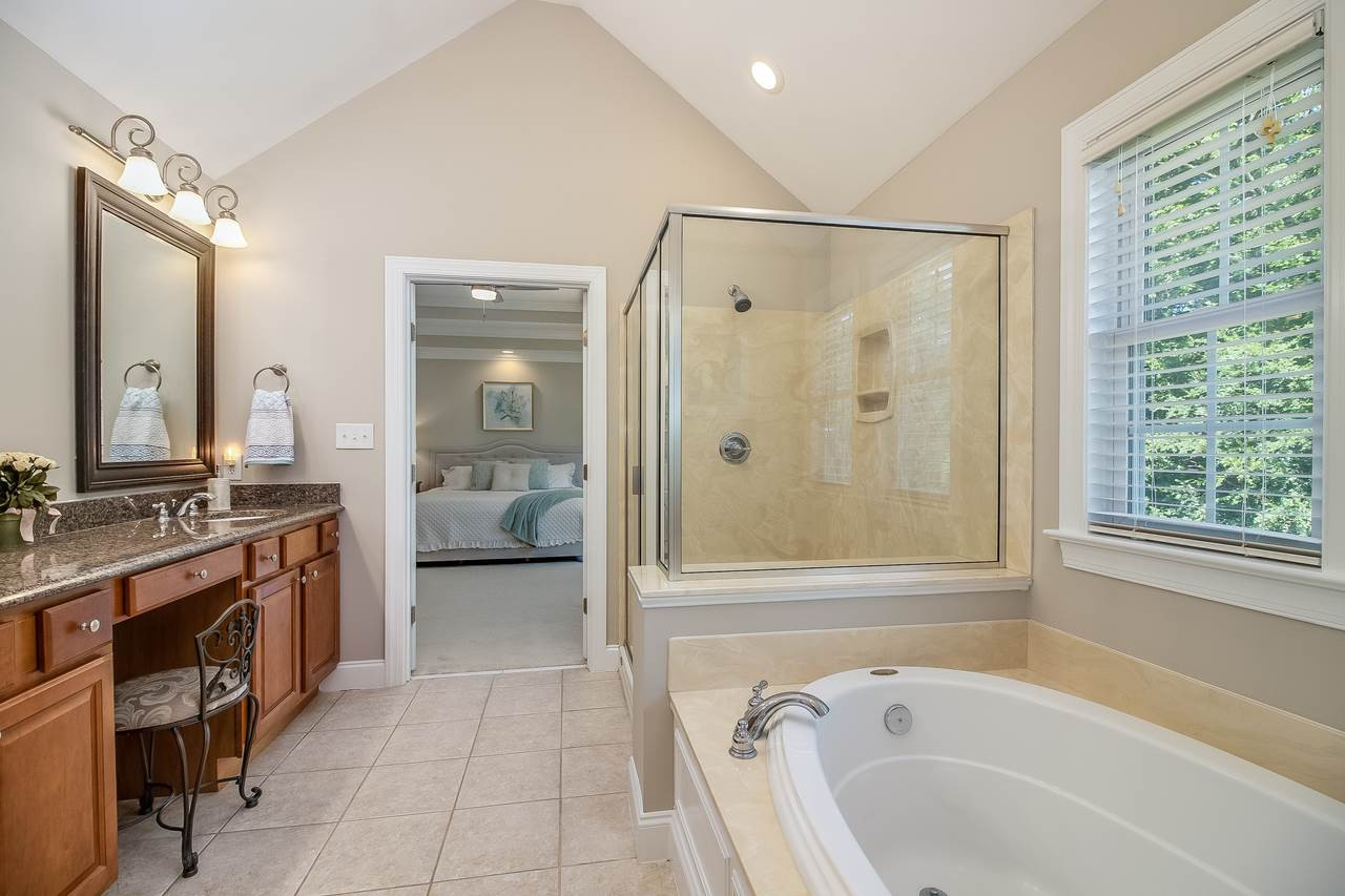 102 Academy Ridge Drive Durham, NC 27705 - Photo 7 of 12 Large, spacious master bath. Double vanity and great soaking tub! Great walk in closet off bathroom Master Bath/Spa