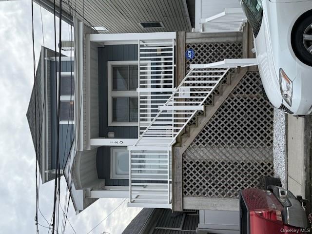 120 East 6th Road Queens, NY 11693 - Photo 1 of 20 a view of a house with a door