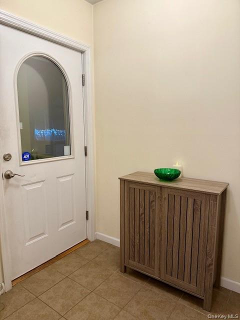 120 East 6th Road Queens, NY 11693 - Photo 12 of 20 a view of a house with a wooden door