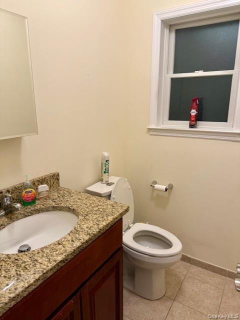 120 East 6th Road Queens, NY 11693 - Photo 16 of 22 a bathroom with a granite countertop sink and a mirror