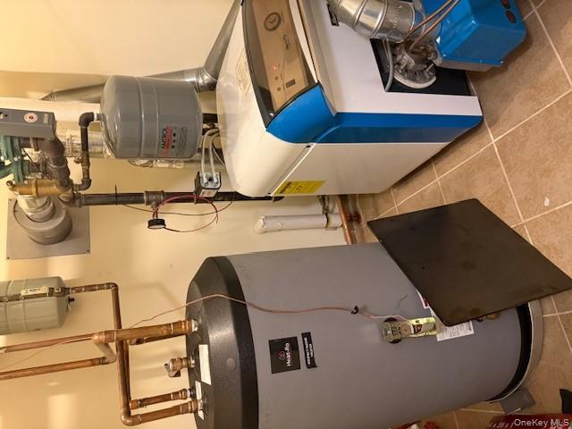 120 East 6th Road Queens, NY 11693 - Photo 16 of 20 a utility room with dryer and washer