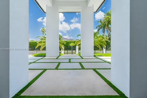 a kitchen that has a sink and a stove in it