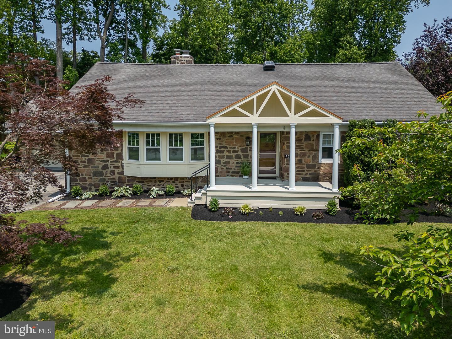 921 Coopertown Road Bryn Mawr, PA 19010 - Photo 1 of 46 a view of house with yard and garden