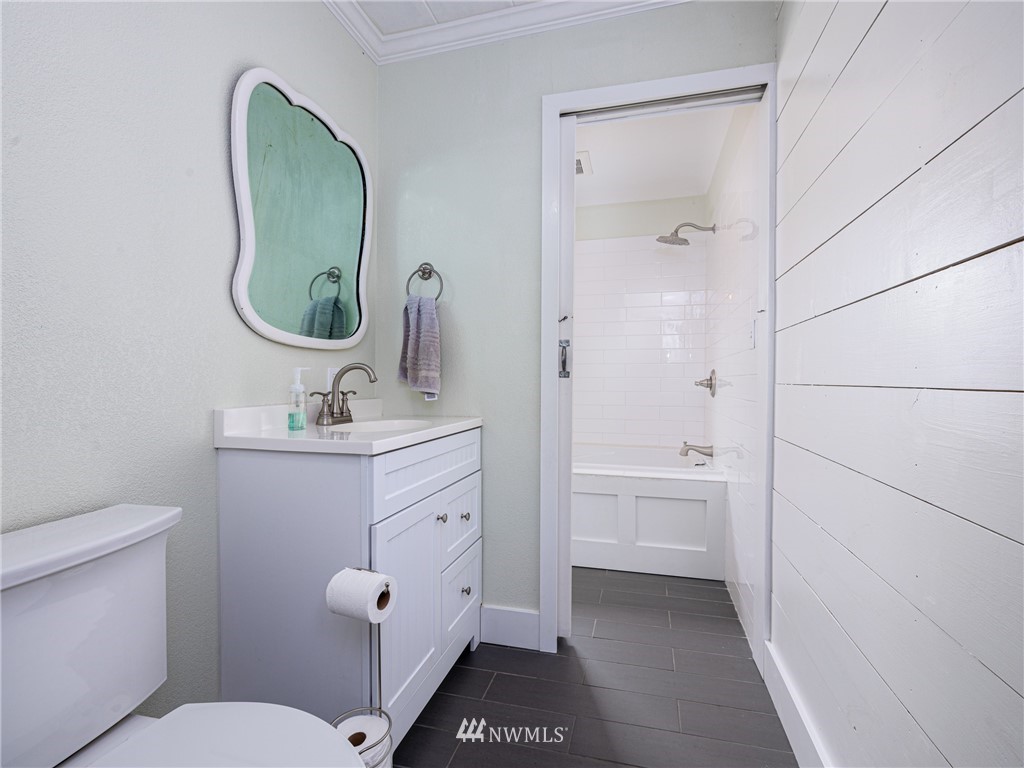 156 Sareault Road Toledo, WA 98591 - Photo 14 of 29 a bathroom with a toilet a sink and mirror