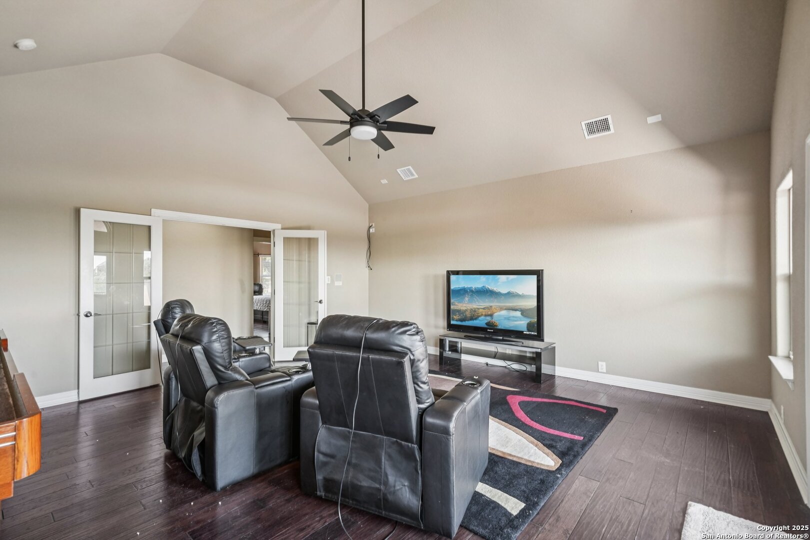 718 Ruidosa Downs Helotes, TX 78023 - Photo 30 of 50 a living room with furniture and wooden floor