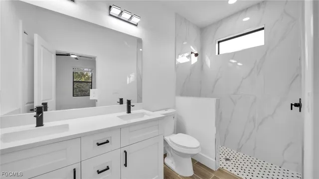 a bathroom with a sink and mirror