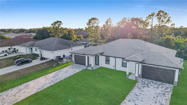 a aerial view of a house with garden