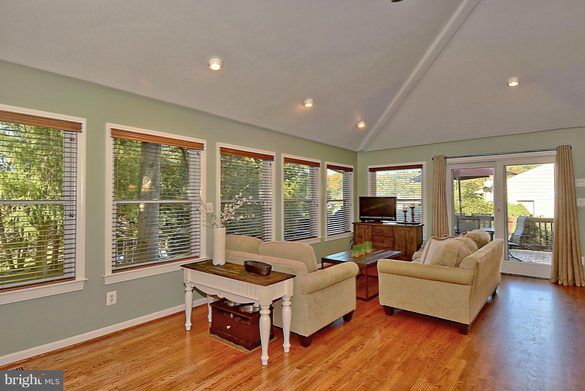 19508 Olney Mill Road Olney, MD 20832 - Photo 10 of 29 a living room with furniture and wooden floor