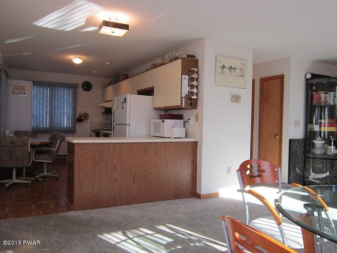 124 Laurel Road Lackawaxen, PA 18435 - Photo 6 of 42 8 DINNING TO KITCHEN IMG_5703