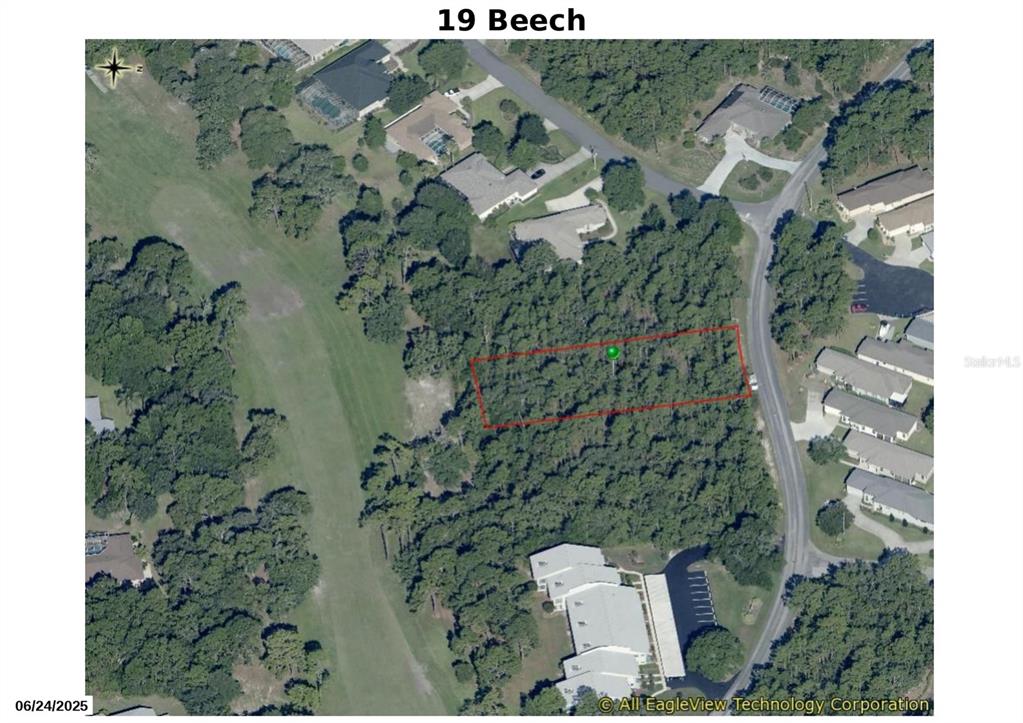 19 Beech Street Homosassa, FL 34446 - Photo 2 of 4 an aerial view of a house with a yard