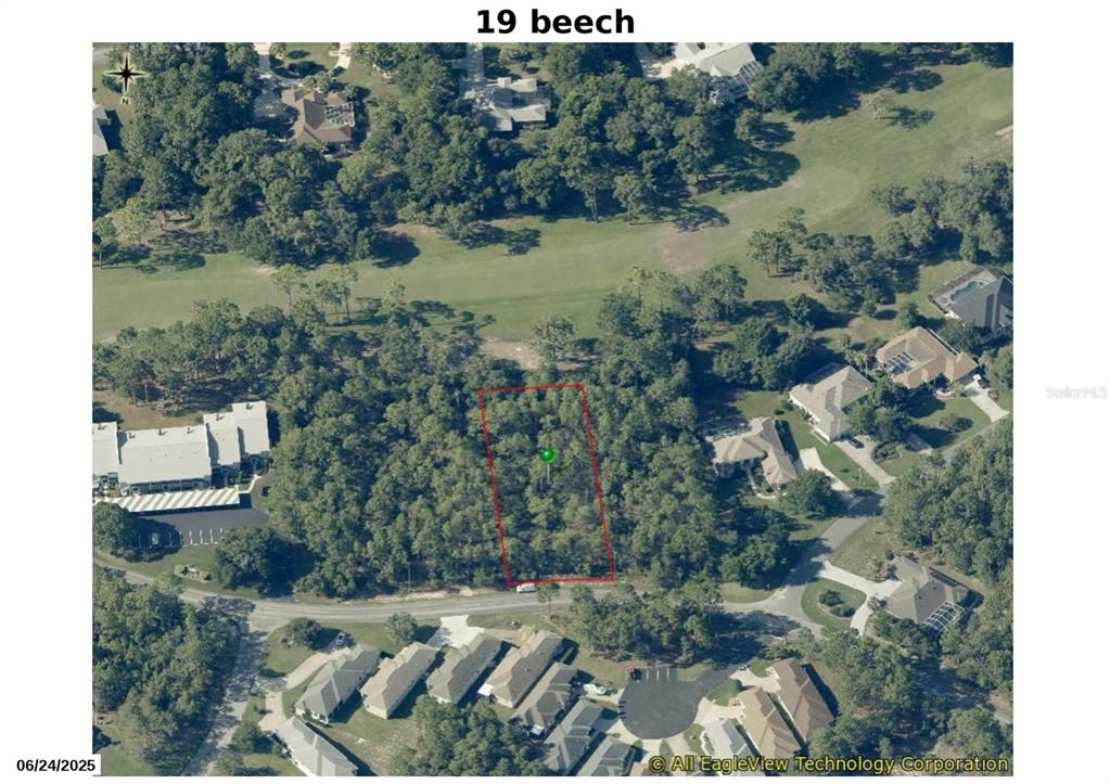 19 Beech Street Homosassa, FL 34446 - Photo 3 of 4 an aerial view of a house with a yard