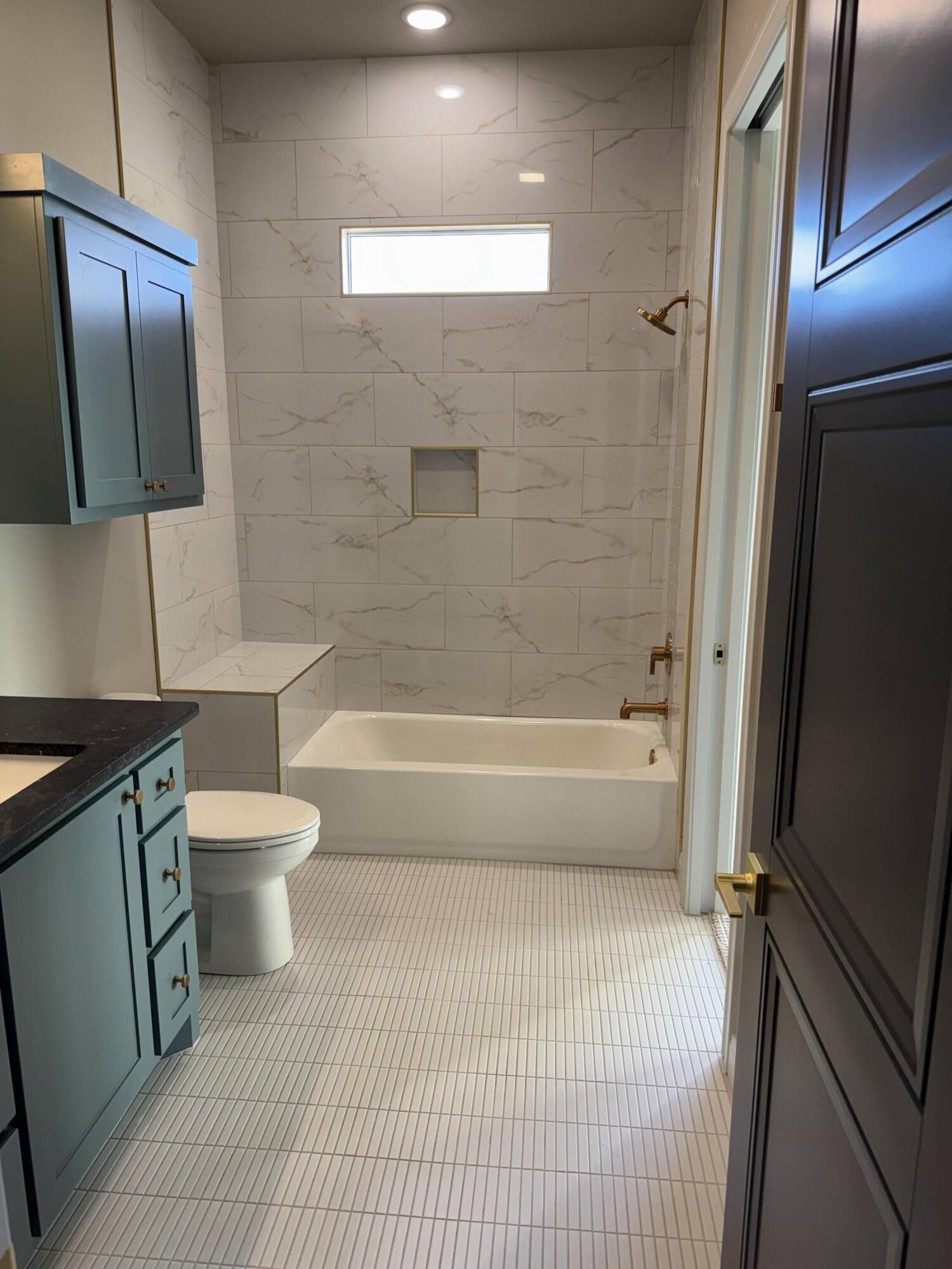 309 Maple New Home, TX 79381 - Photo 22 of 27 a bathroom with a toilet a sink and bathtub
