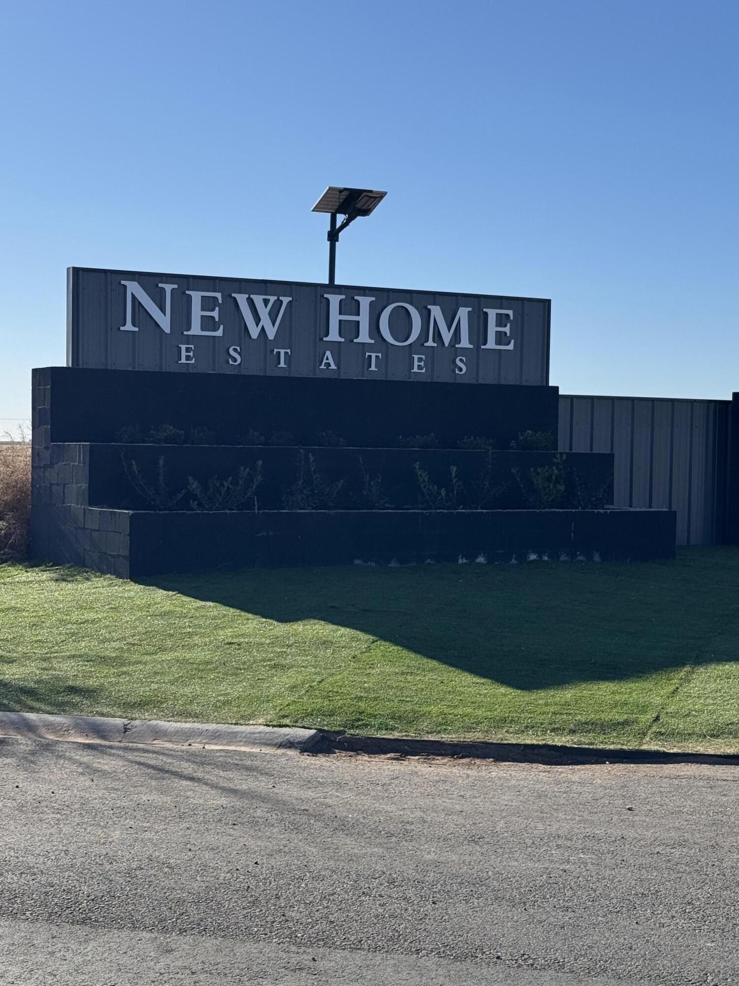 309 Maple New Home, TX 79381 - Photo 27 of 27 a sign that is sitting on the side of a road