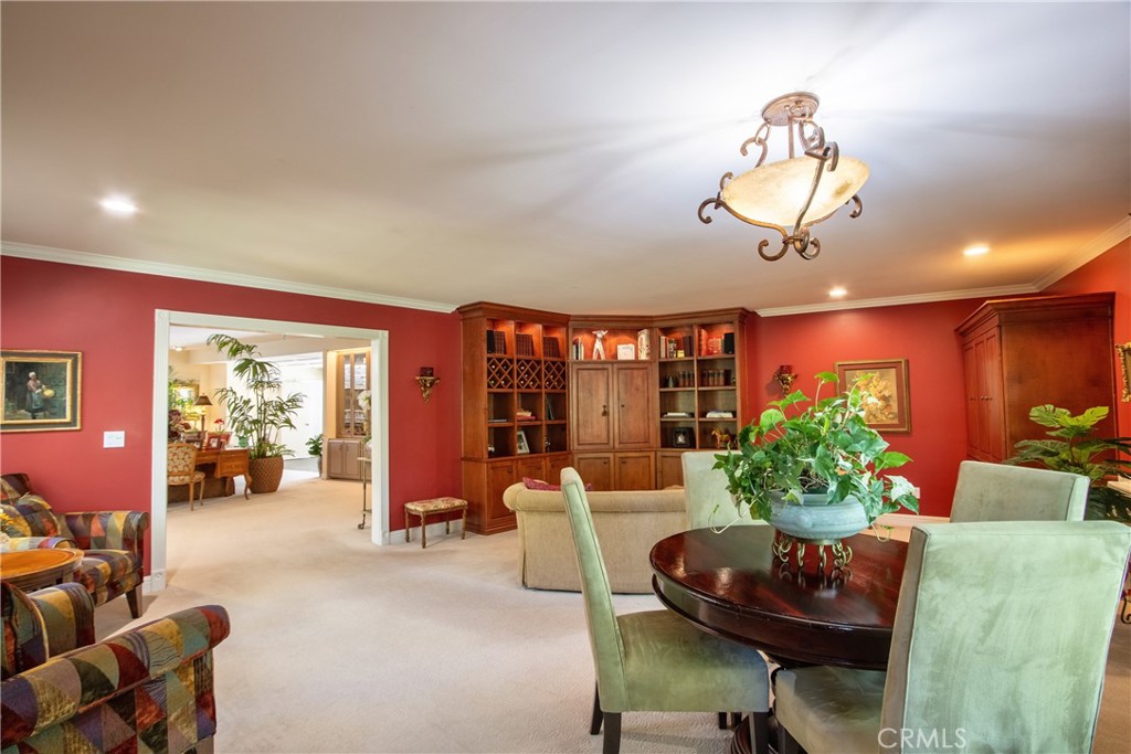 1175 Riverview Drive Fallbrook, CA 92028 - Photo 13 of 57 a living room with furniture chandelier and a large window
