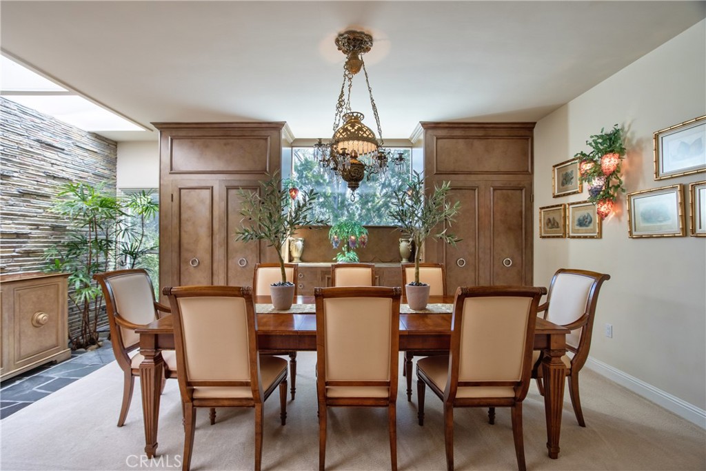 1175 Riverview Drive Fallbrook, CA 92028 - Photo 17 of 57 a dining room with furniture a chandelier and window