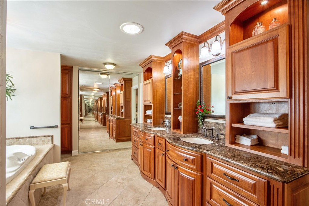 1175 Riverview Drive Fallbrook, CA 92028 - Photo 24 of 57 a kitchen with stainless steel appliances granite countertop a sink and cabinets